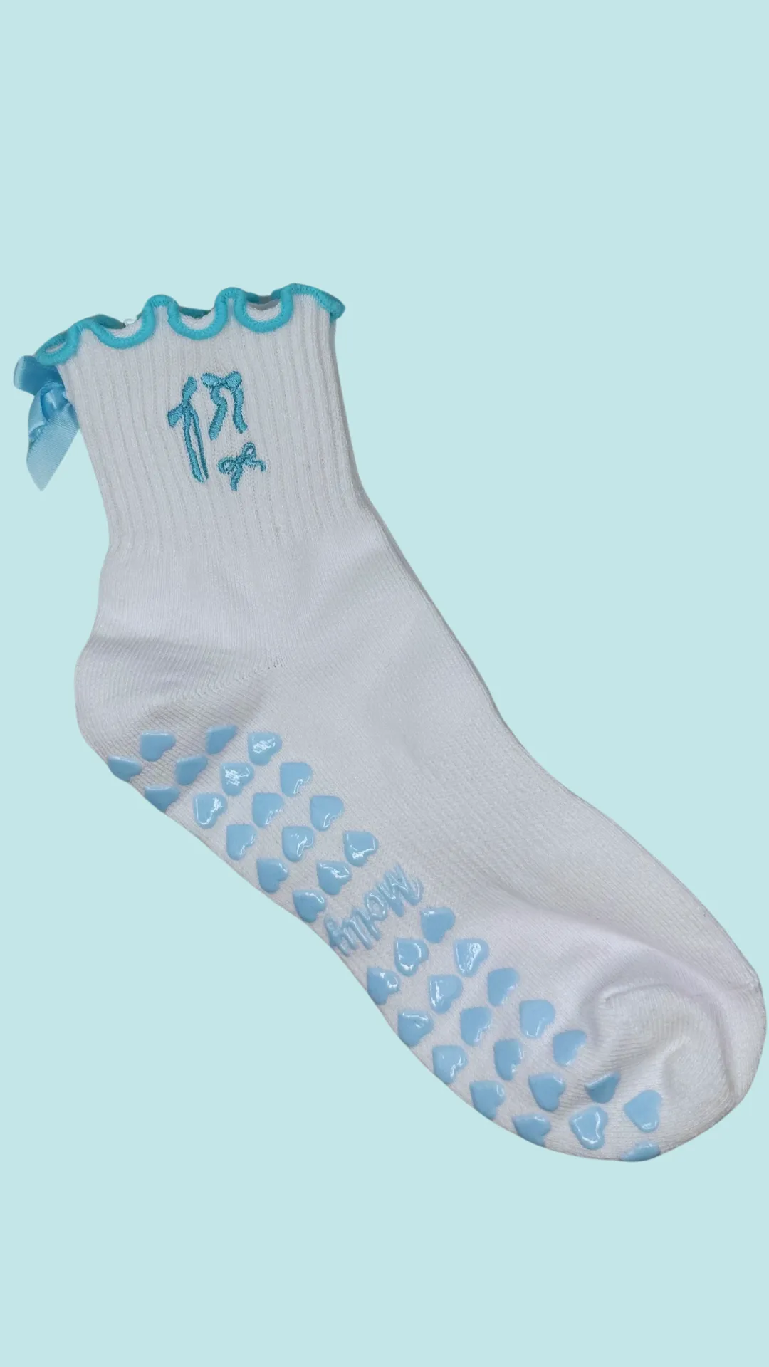 Light blue coquette bow grip sock