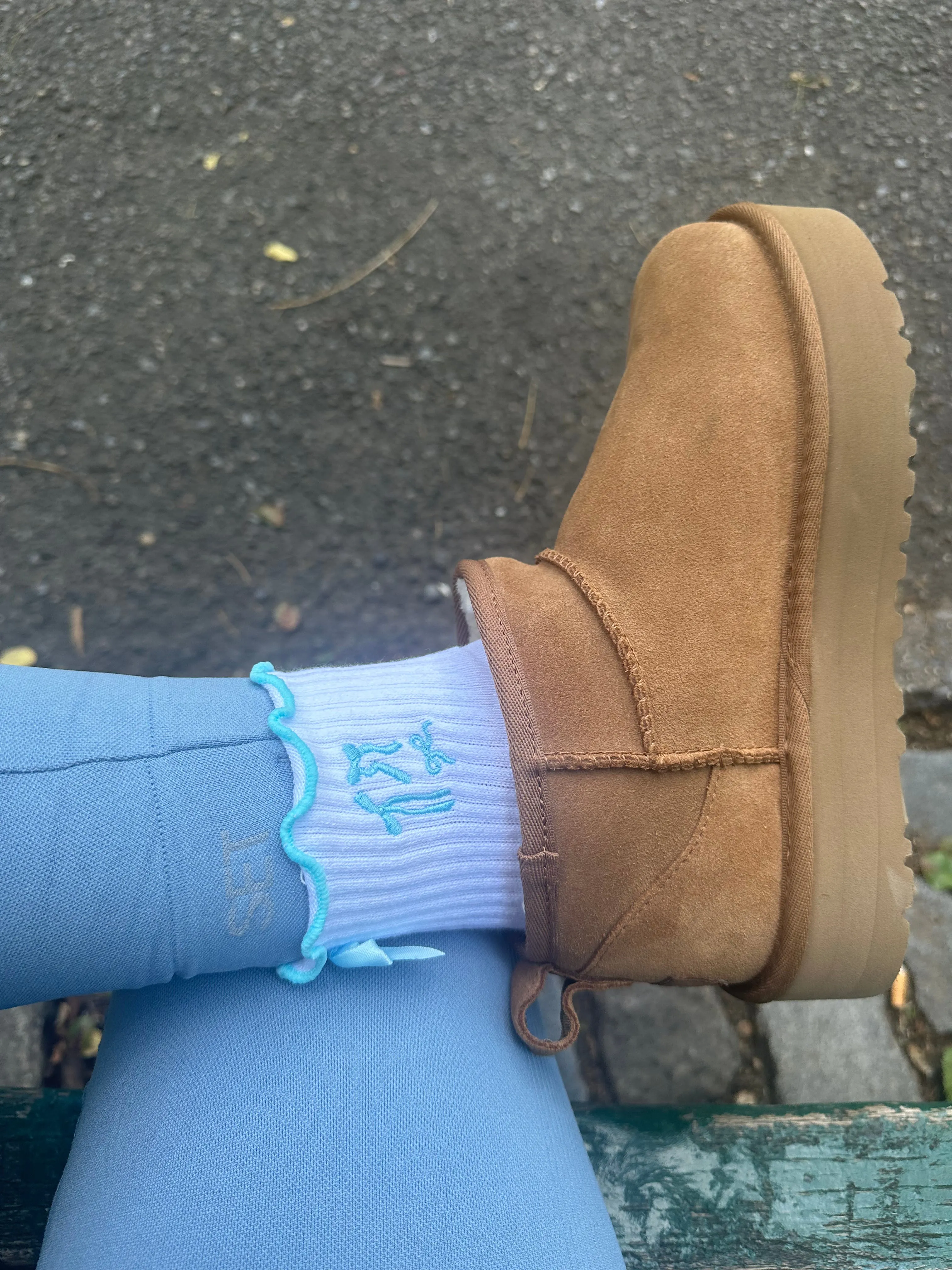 Light blue coquette bow grip sock