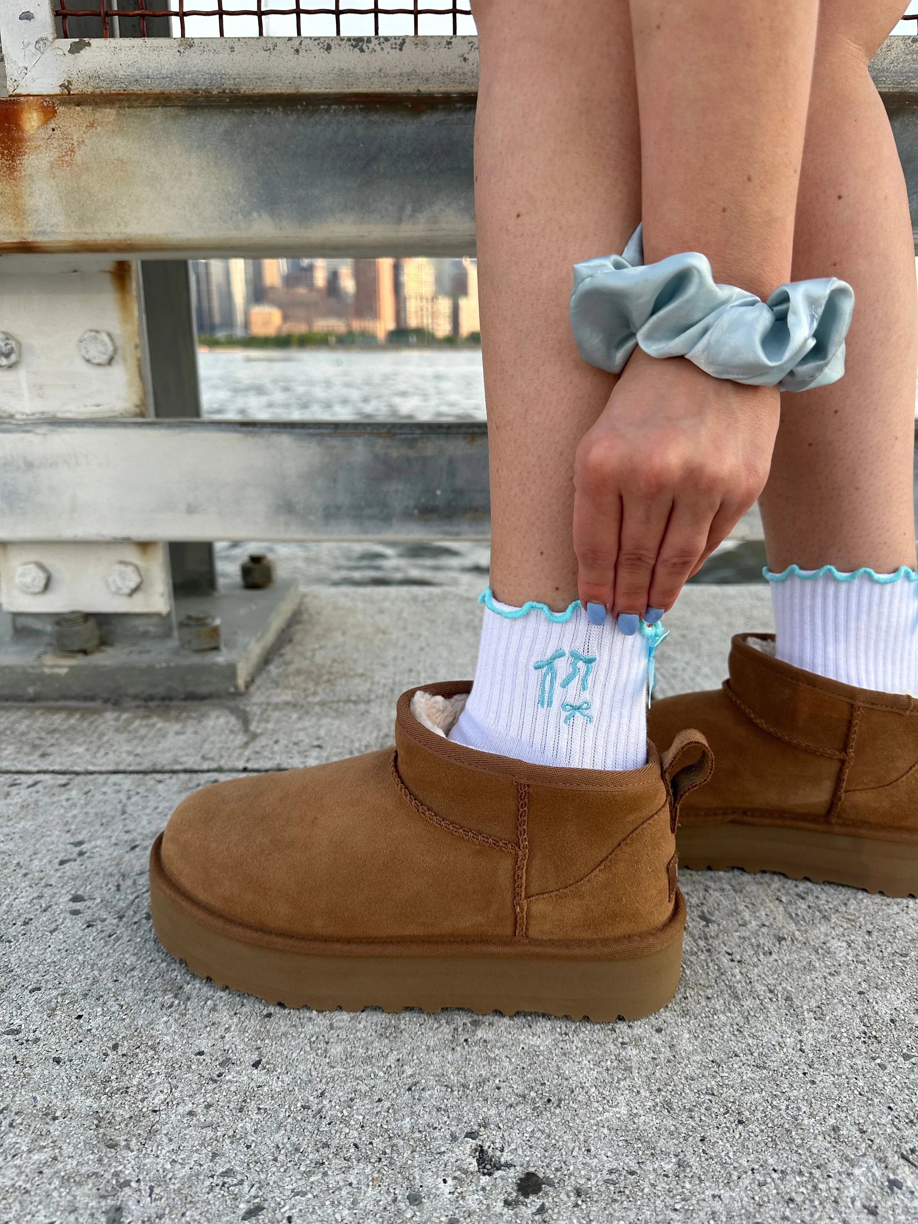 Light blue coquette bow grip sock